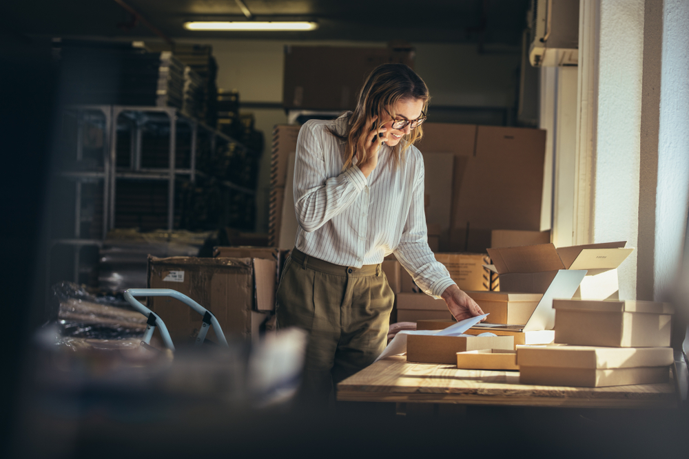 ecommerce; woman verifying online orders ready to ship